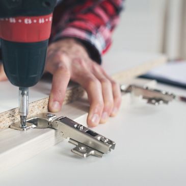 Employee assembling furniture.