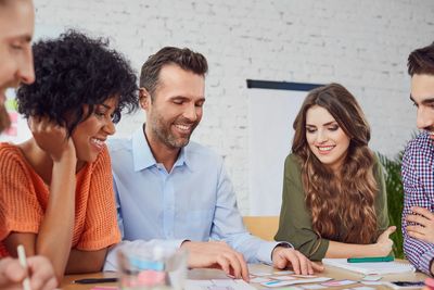 Group of employees collaborating on a project.