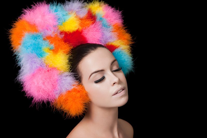 Young woman wearing colourful headdress