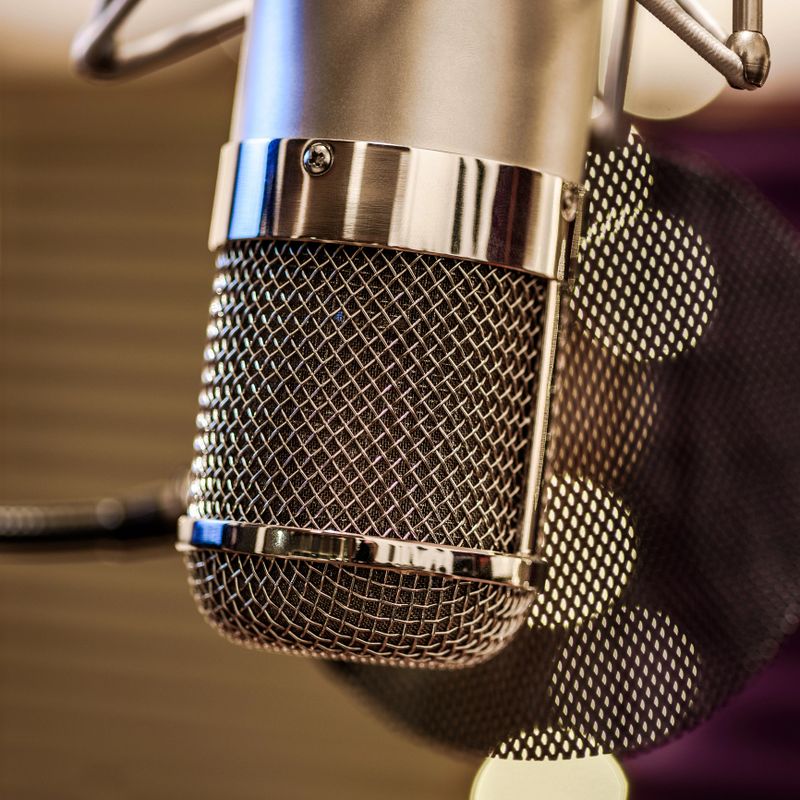 Chrome grilled recording studio tube microphone