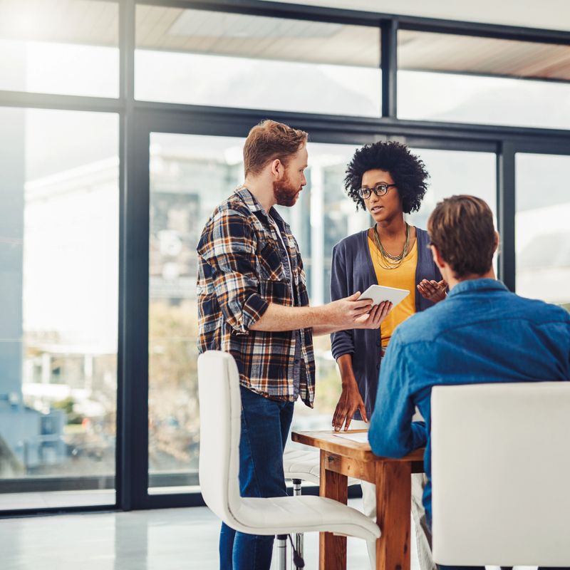 Shot of a group of creative professionals having a meeting in a modern office