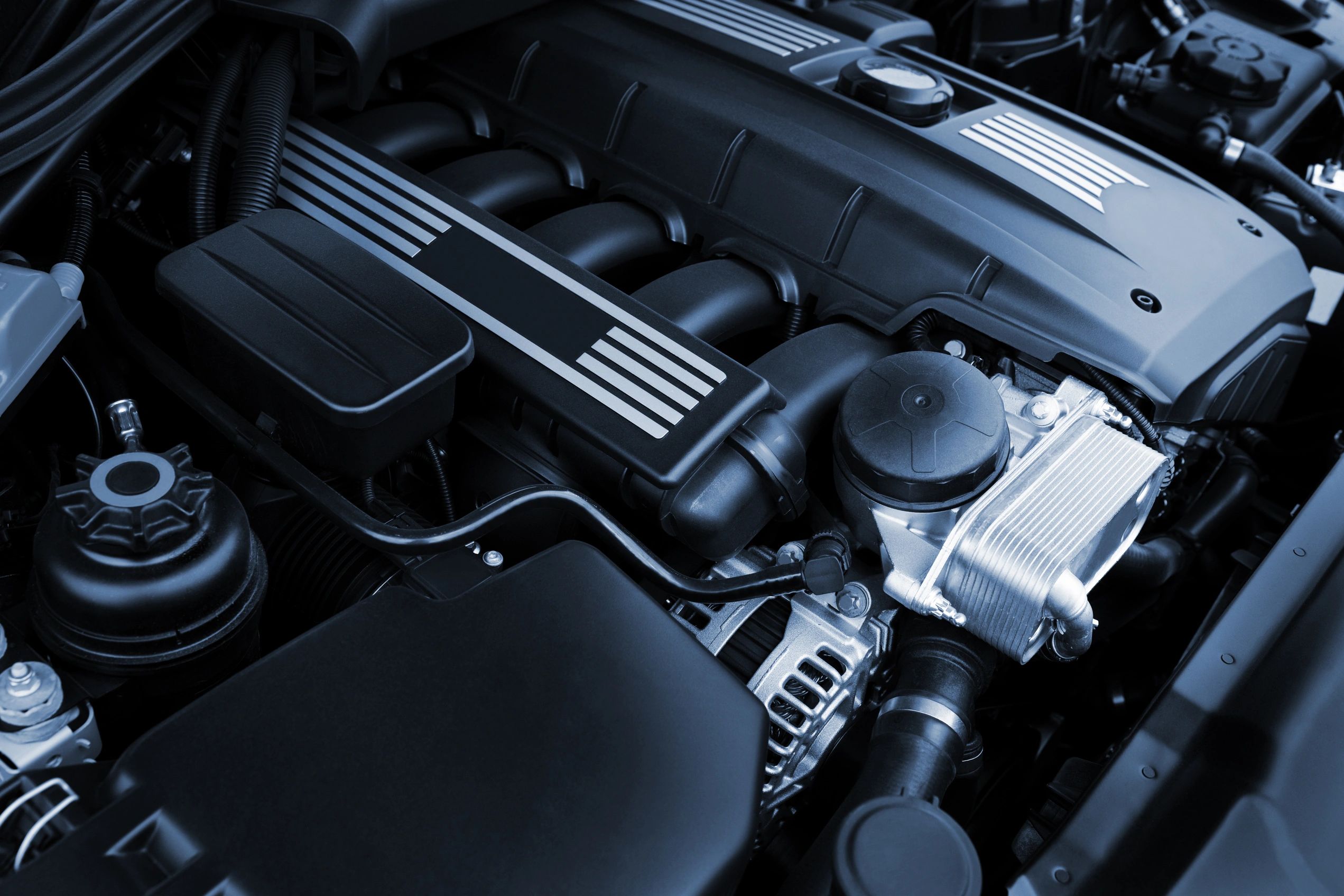 Engine bay detailing service showing cleaned engine componets in Garfield Arkansas