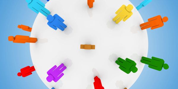 Colorful human icons arranged in a circle on a white sphere.
