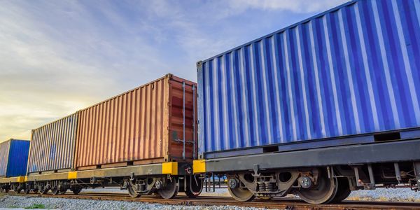 Freight train with colorful cargo containers.
