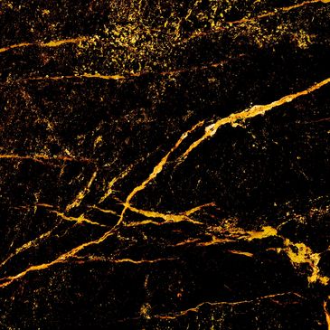 Gold colored trace in a black background