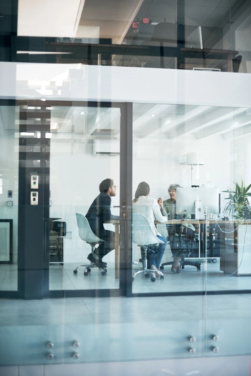 Shot of a group of businesspeople having a discussion in an office