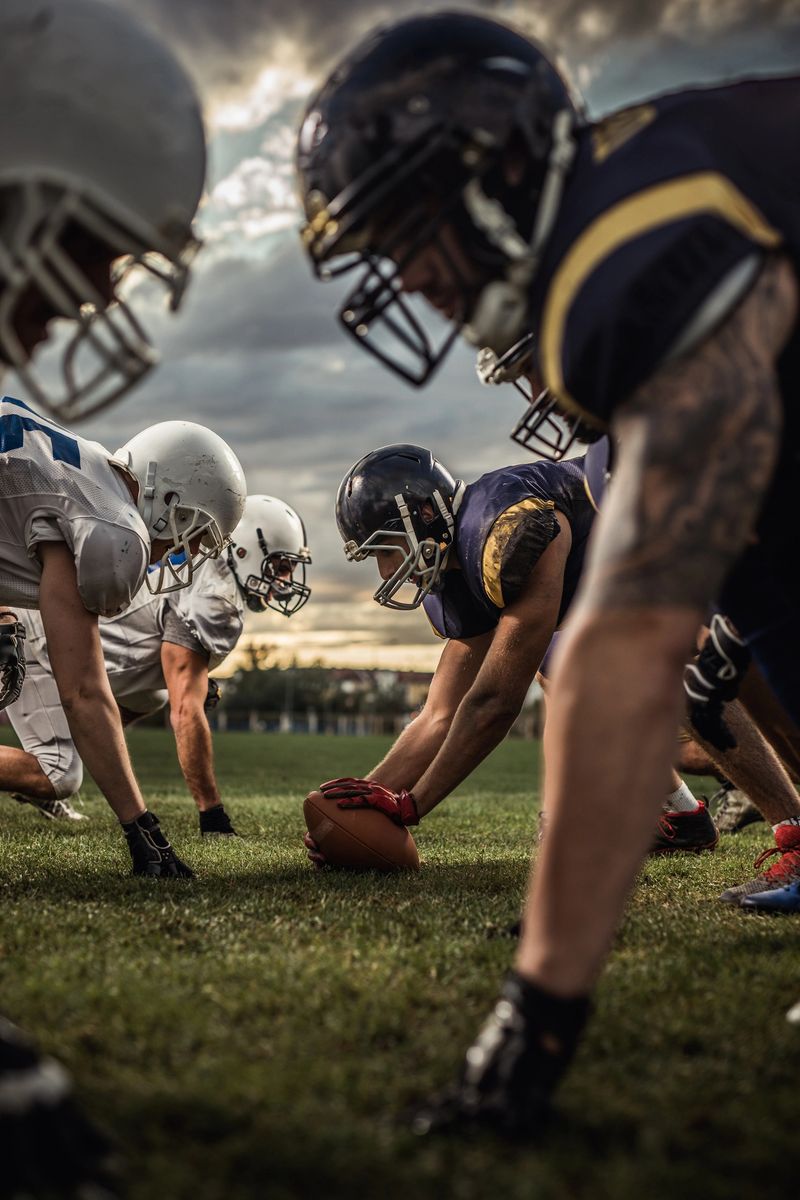 American football players confronting before the beginning of a match.