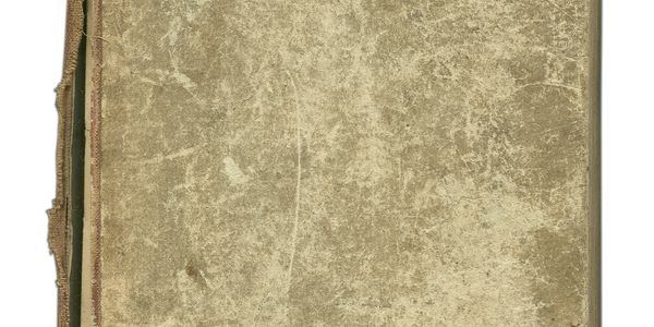 Old, worn book cover with frayed edges.