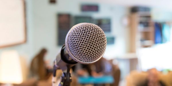Close-up of a microphone in a room.