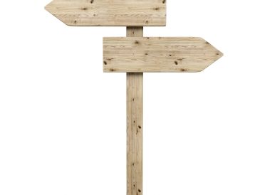 Wooden signpost with two blank directional arrows.