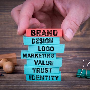 Stacked blocks with branding terms like brand, design, and trust.