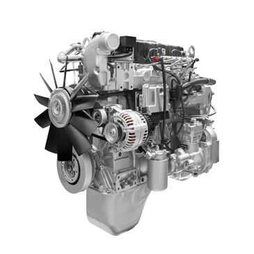 A detailed image of a modern diesel engine with cooling fan and alternator.