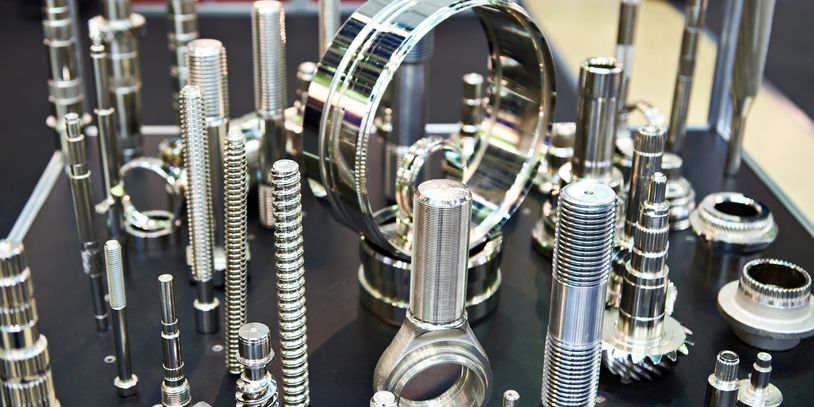 Precision CNC-machined metal components showcasing tight tolerances and polished finishes.