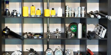 Organized shelves displaying automotive filters and parts.