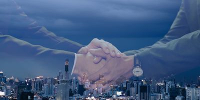 Handshake for long-term sponsorship partnership.