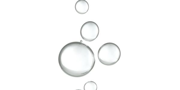 Transparent water droplets of various sizes on a white background.