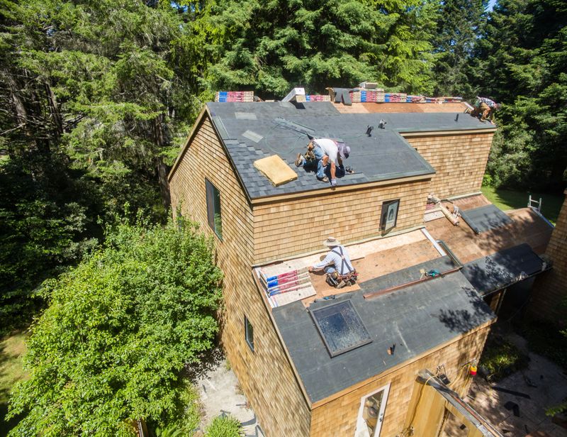 Installing new roof taken from a drone