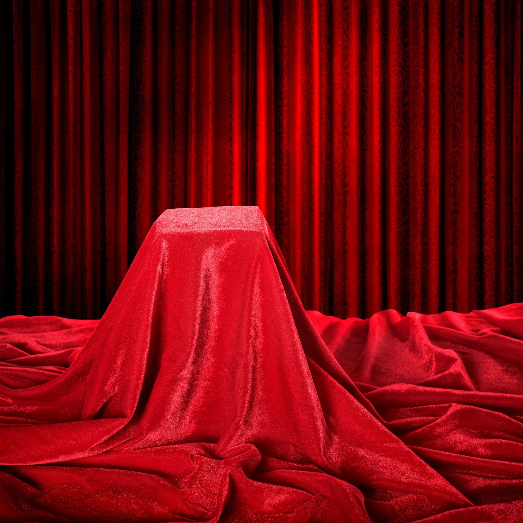  A red lotus hanging above a box 