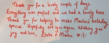 A handwritten thank you note expressing gratitude and well wishes.