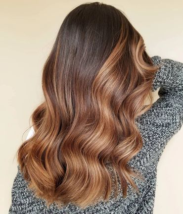 Caramel balayage with root melting.