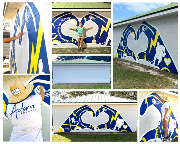 A vibrant mural featuring hockey themes with blue, yellow, and white colors.