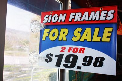 a sign that says sign frames for sale 2 for $ 19 98