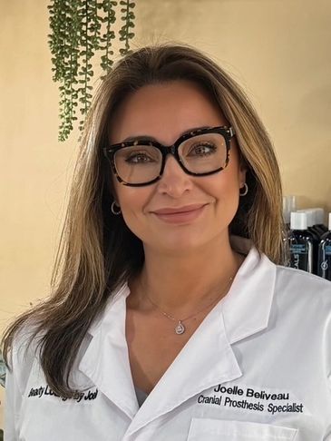 Smiling woman in glasses and white coat with 'Cranial Prosthesis Specialist' title.