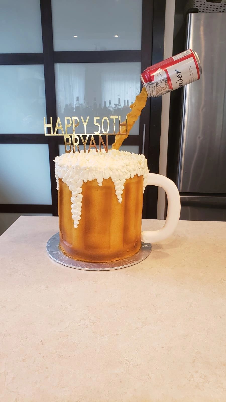 Creative beer mug cake with a floating Budweiser can for Bryan's 50th birthday.