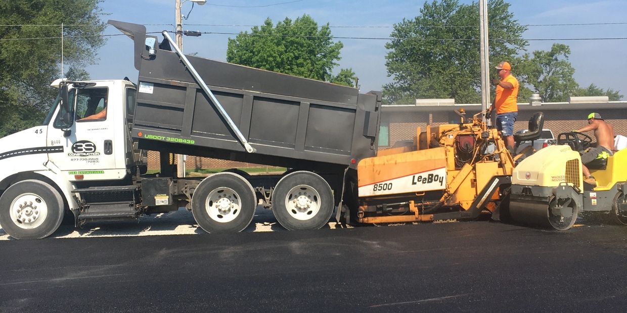 3S Asphalt  Construction asphalt contractors installing an asphalt parking lot for a school