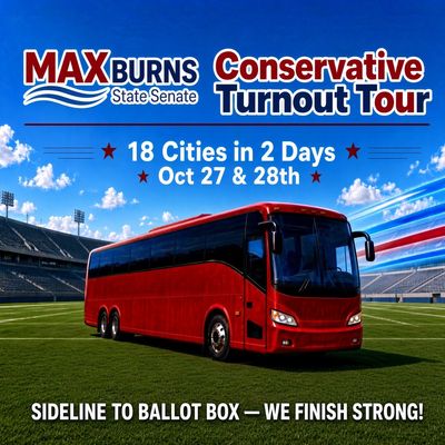 Max Burns Conservative Turnout Tour bus at stadium.
