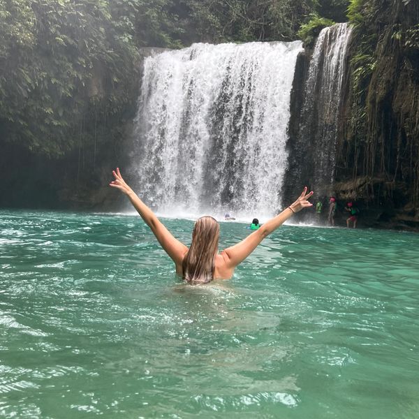 Swimming in a waterfall in the Philippines