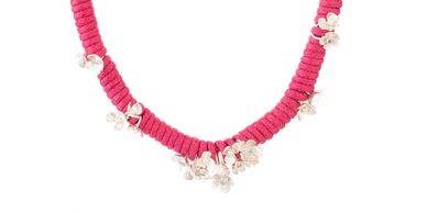 necklace with fuchsia pink cord, sterling silver flowers, blue topaz stones. 