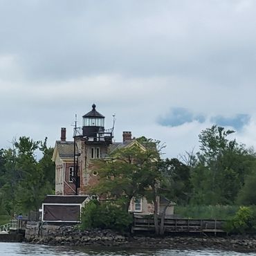 Castle-like building on shore.