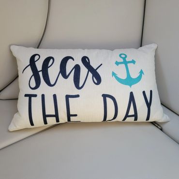 Nautical pillow on boat seat.