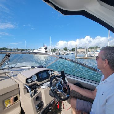Captain at the boat helm.