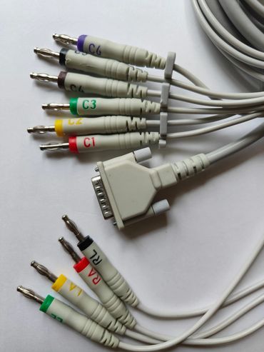 Multi-colored medical or electronic cables with labeled connectors on a white background.