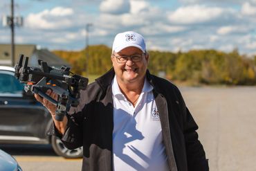 Patrick Foré carrying a folded M30T drone