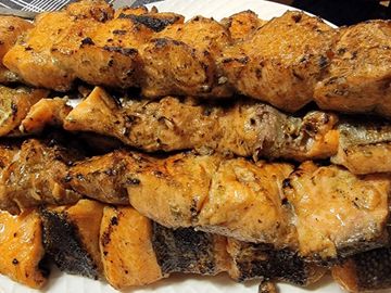 Experience Afghan flavor: Juicy Chicken Kebabs, grilled to perfection.
