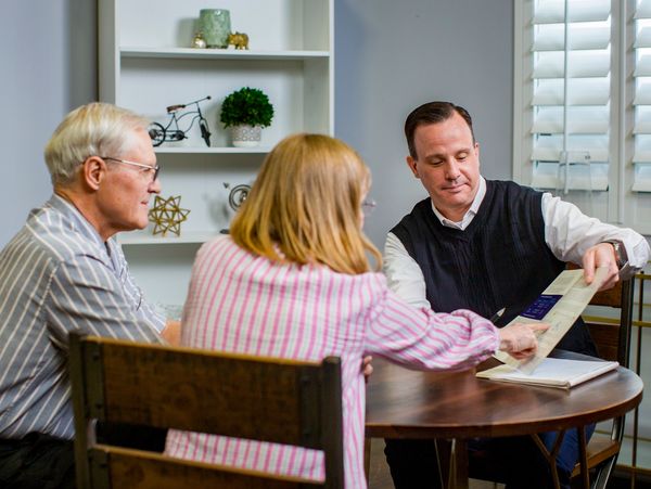 Stewart Smith, retirement planner in Greenville SC, meeting with clients to review their retirement income plan.