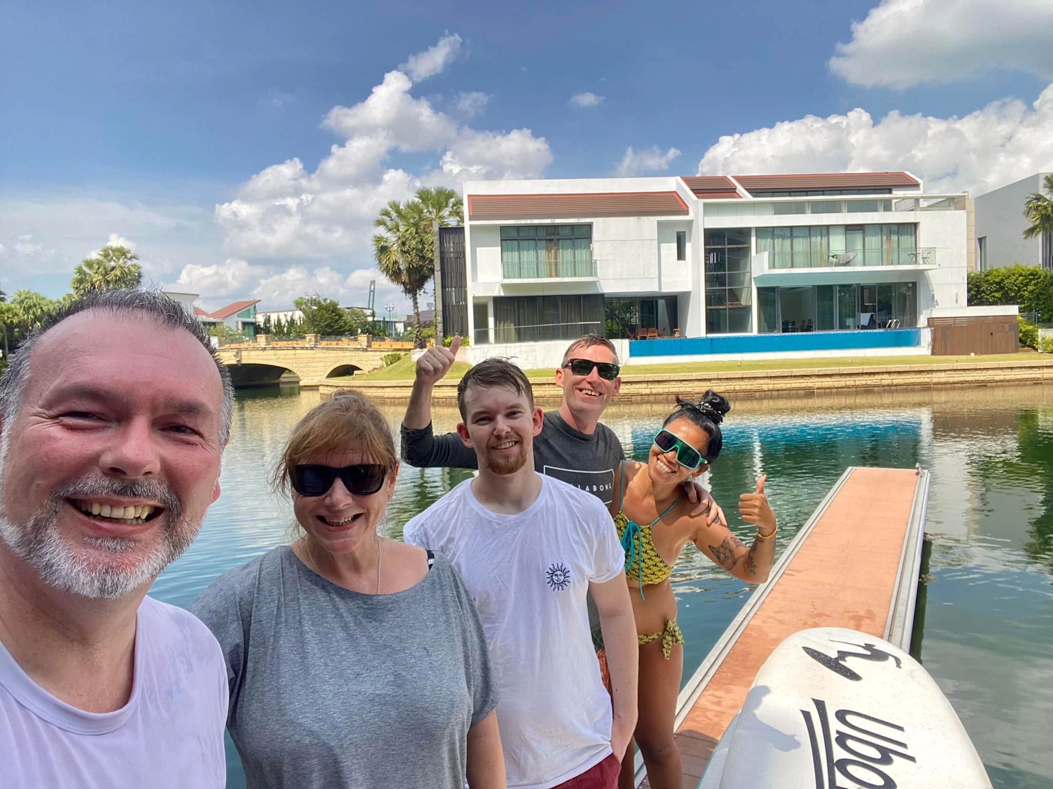 Group of people smiling and enjoying Sentosa