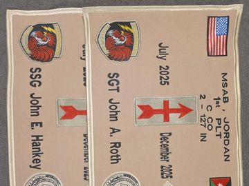 Two military patches with names and dates for SSG John E. Hankey and SGT John A. Roth.