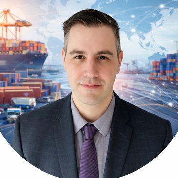 Professional man in suit with shipping containers and cargo ship background.