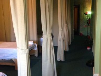 A long shot of the massage rooms 