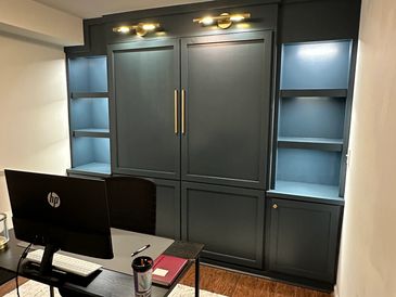 Murphy bed office backdrop with sconces 