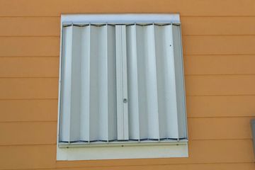 hurricane accordion shutters