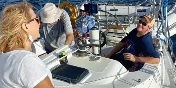 Relaxing in the seating area during a Day Sail with Florida Sailboat Charter