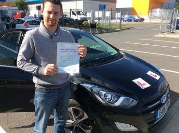 Man passing their automatic driving test