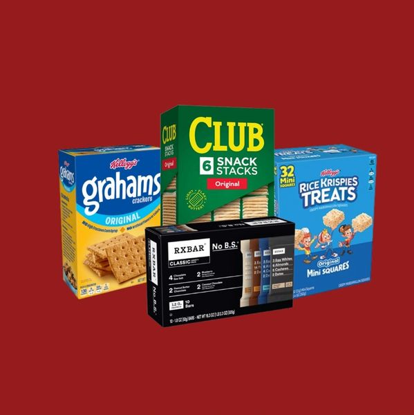 Variety of snack boxes including crackers, snack stacks, rice krispies treats, and protein bars on red background.
