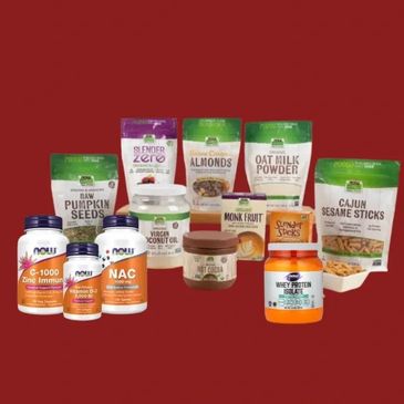 A collection of health supplements and organic snacks against a red background.