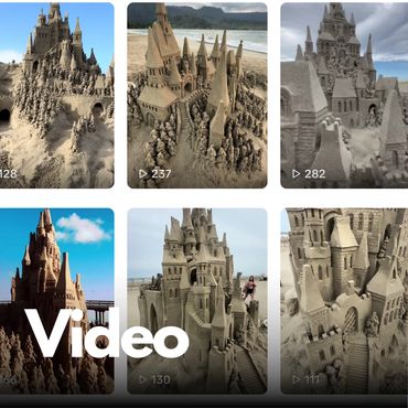 Intricate sandcastle designs resembling medieval castles at the beach.